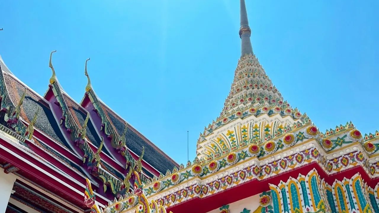 The ornate spire and roofs of a temple in Bangkok, Thailand