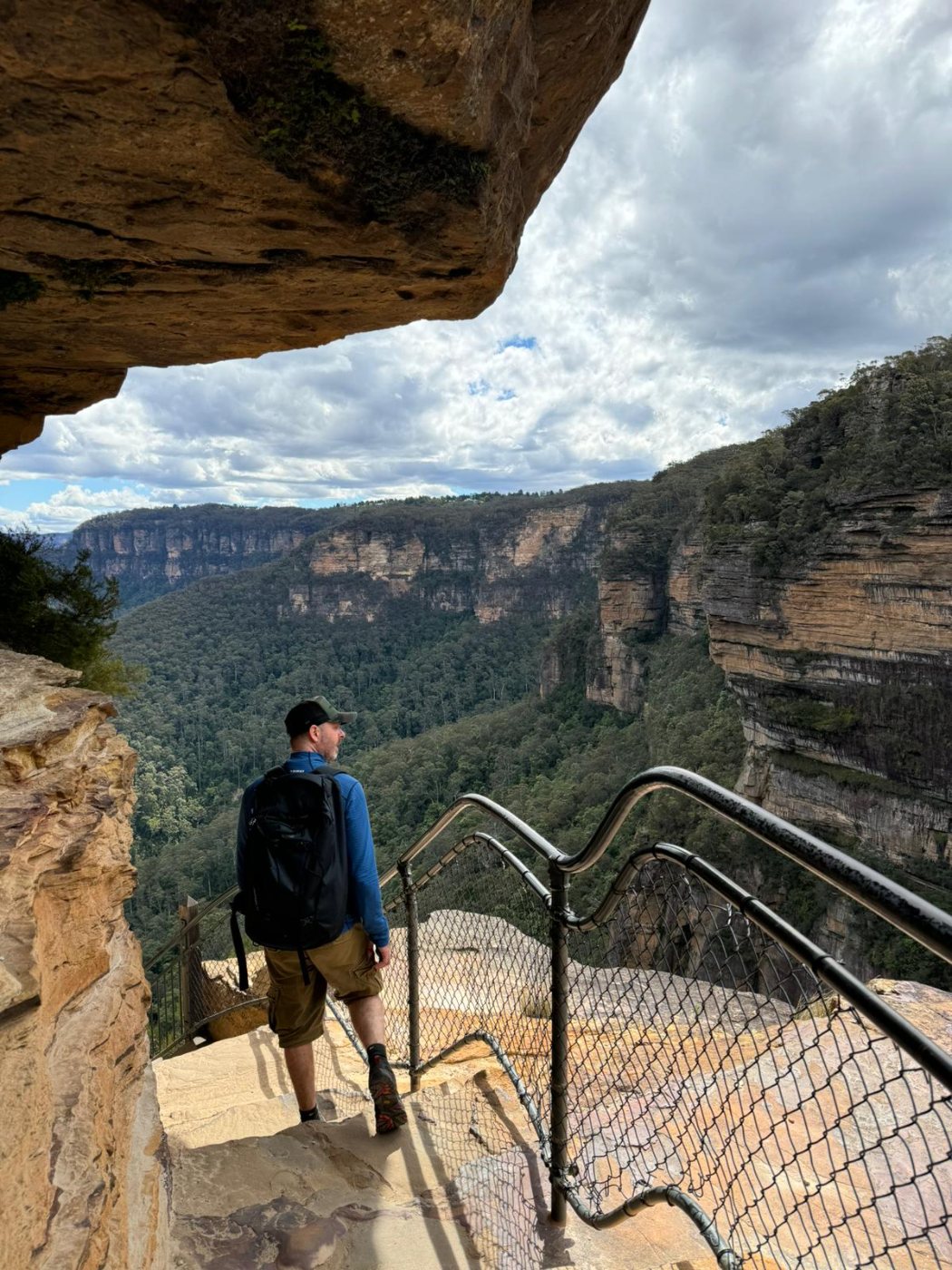 Descending the cliff steps