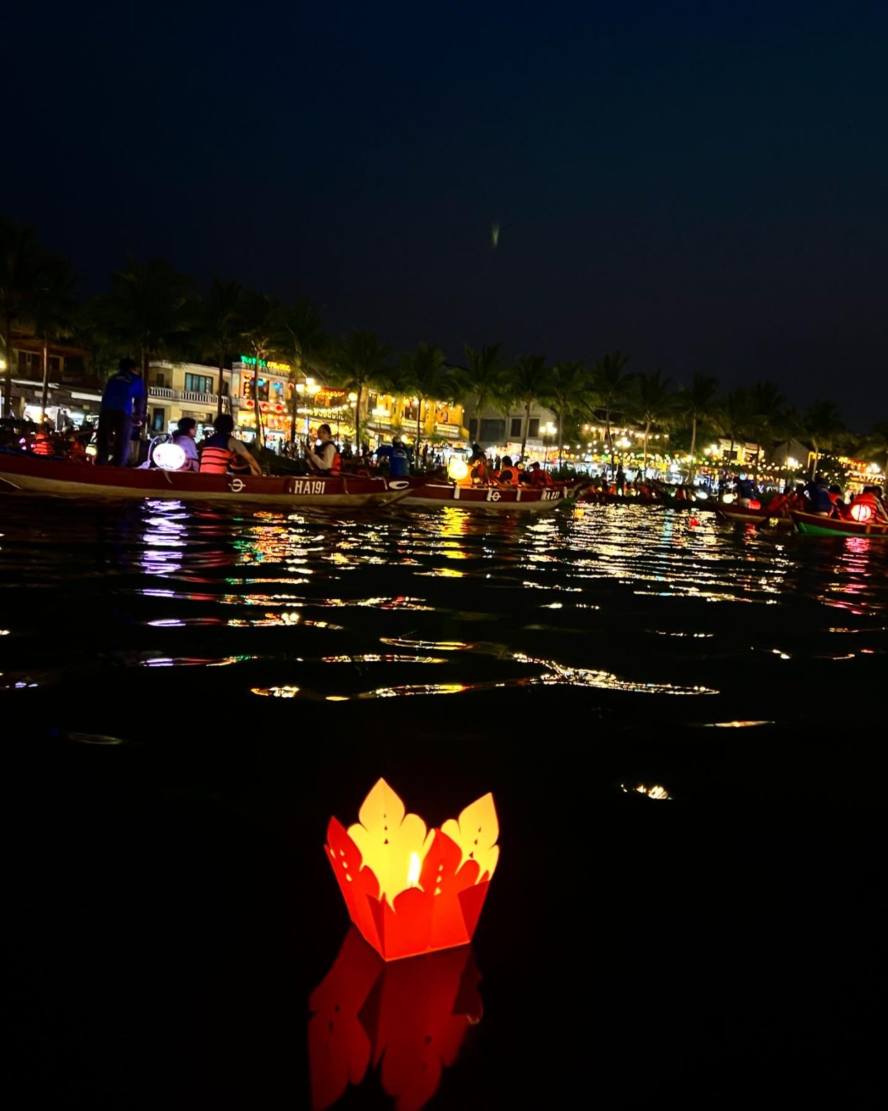 Lantern boats at sunset