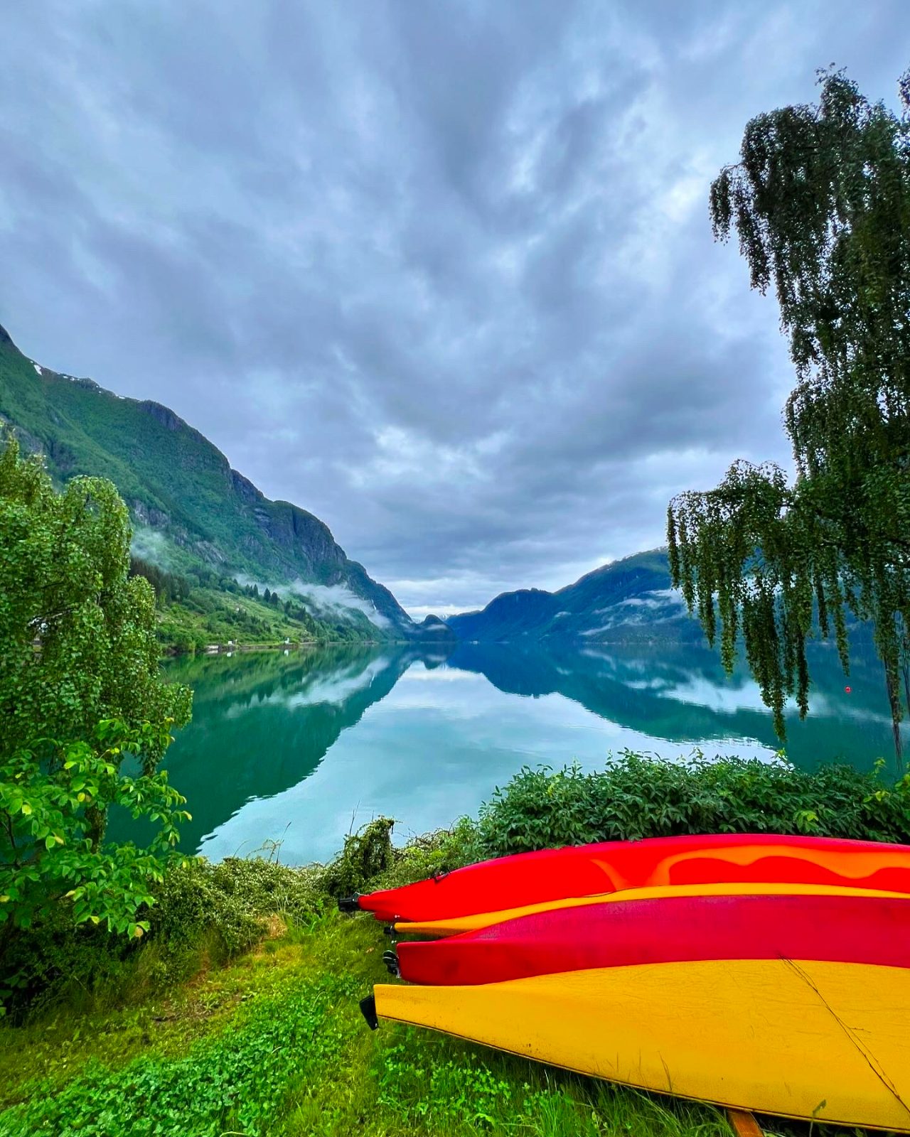 Kayaks on the still water