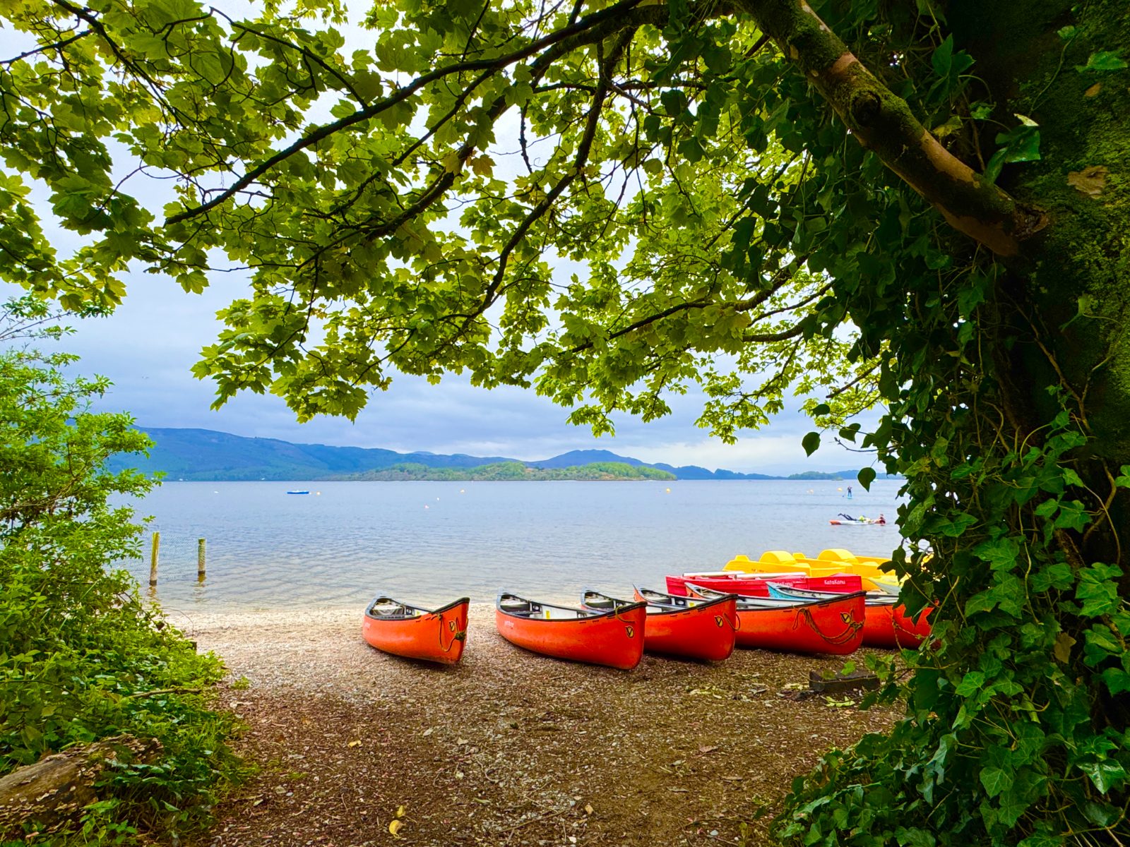 Canoes on the shore of Loch Lomond